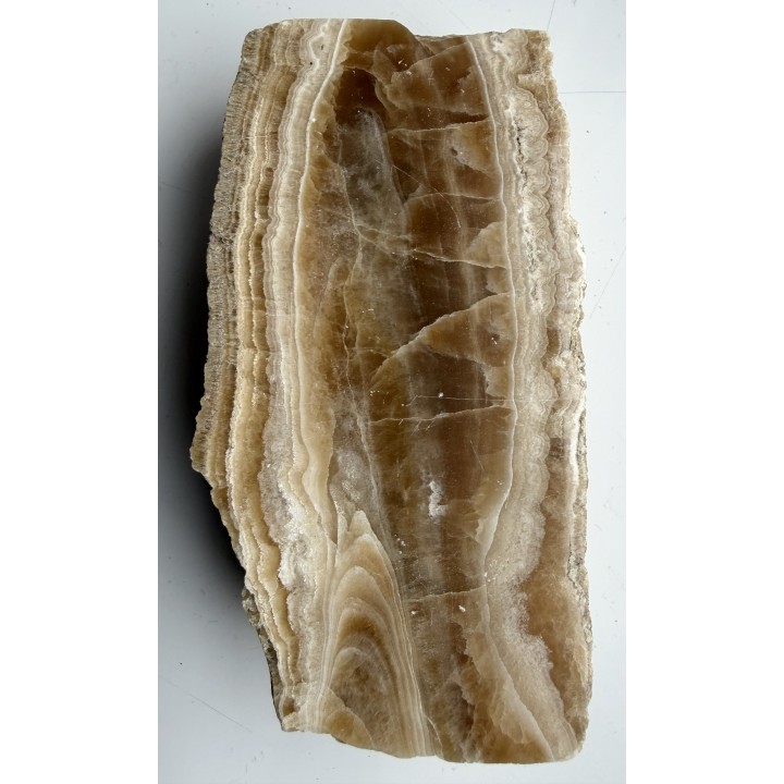 Polerowany okaz aragonitowo-kalcytowej polewy ze Sławniowic