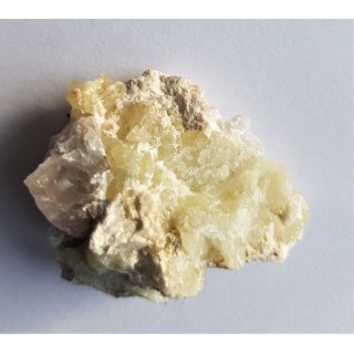 Duże, masywne skupienie zielonożółtego prehnitu z Zimnika k. Strzegomia