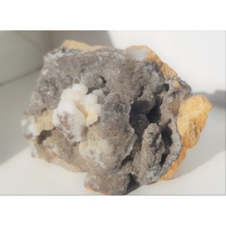 Szczotka kwarcowa pokryta kalcytem ze Sławniowic