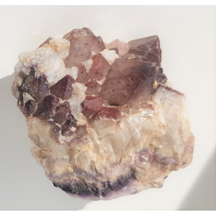 Szczotka kwarców żelazistych na fluorycie z Kletna